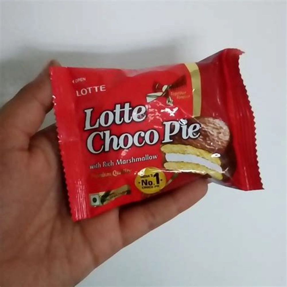 Person Hand with Orion Choco Pie Chocochip and Orange Snack Cake. a Lot of  Sweet Snack on Background Editorial Stock Photo - Image of cookie, wrapper:  231138638