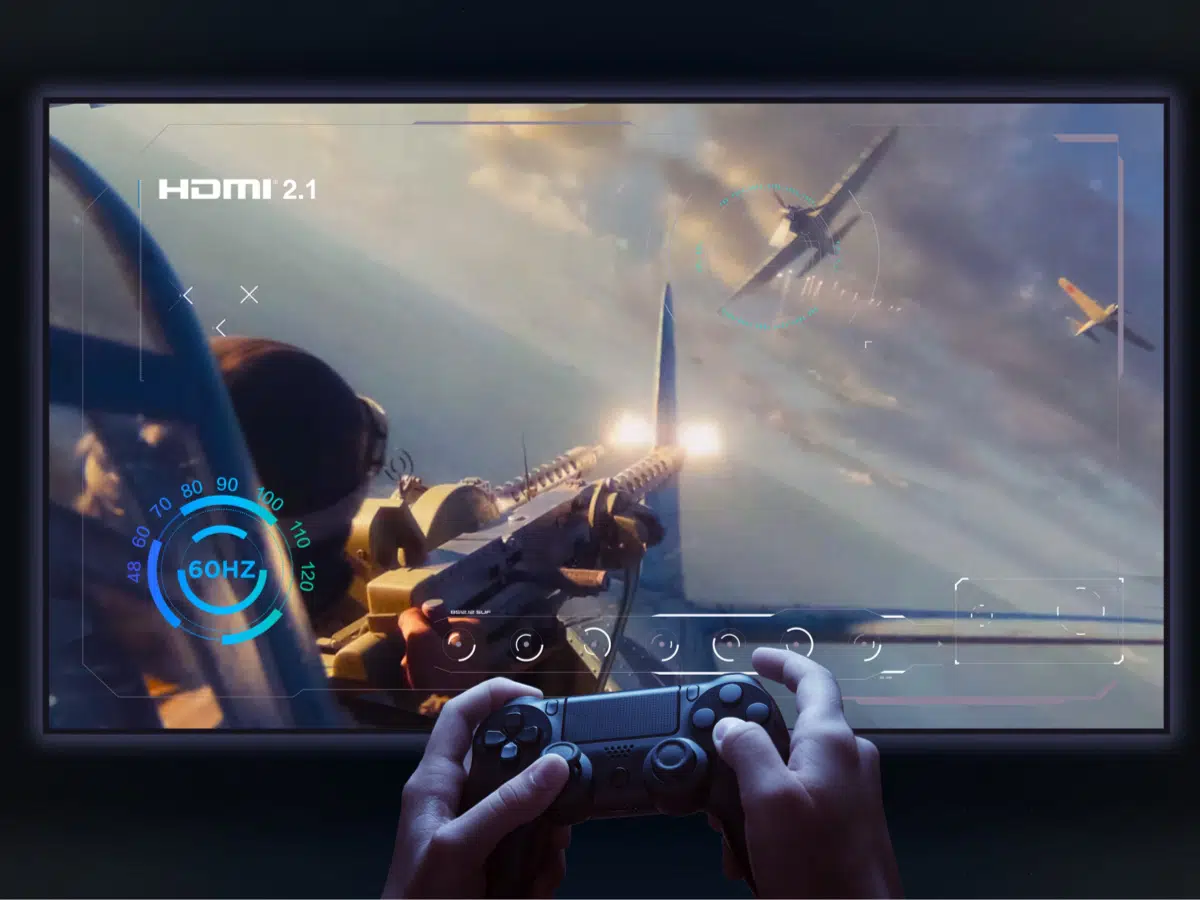 An image depicting a gamer playing a video game with a responsive TV, highlighting features such as HDMI 2.1, ALLM, and eARC that provide low input lag, quick response, and enhanced audio for an immersive gaming experience.