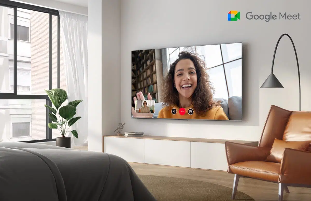 A lively screenshot capturing a heartwarming Google Meet video call on the TCL C745 TV screen.