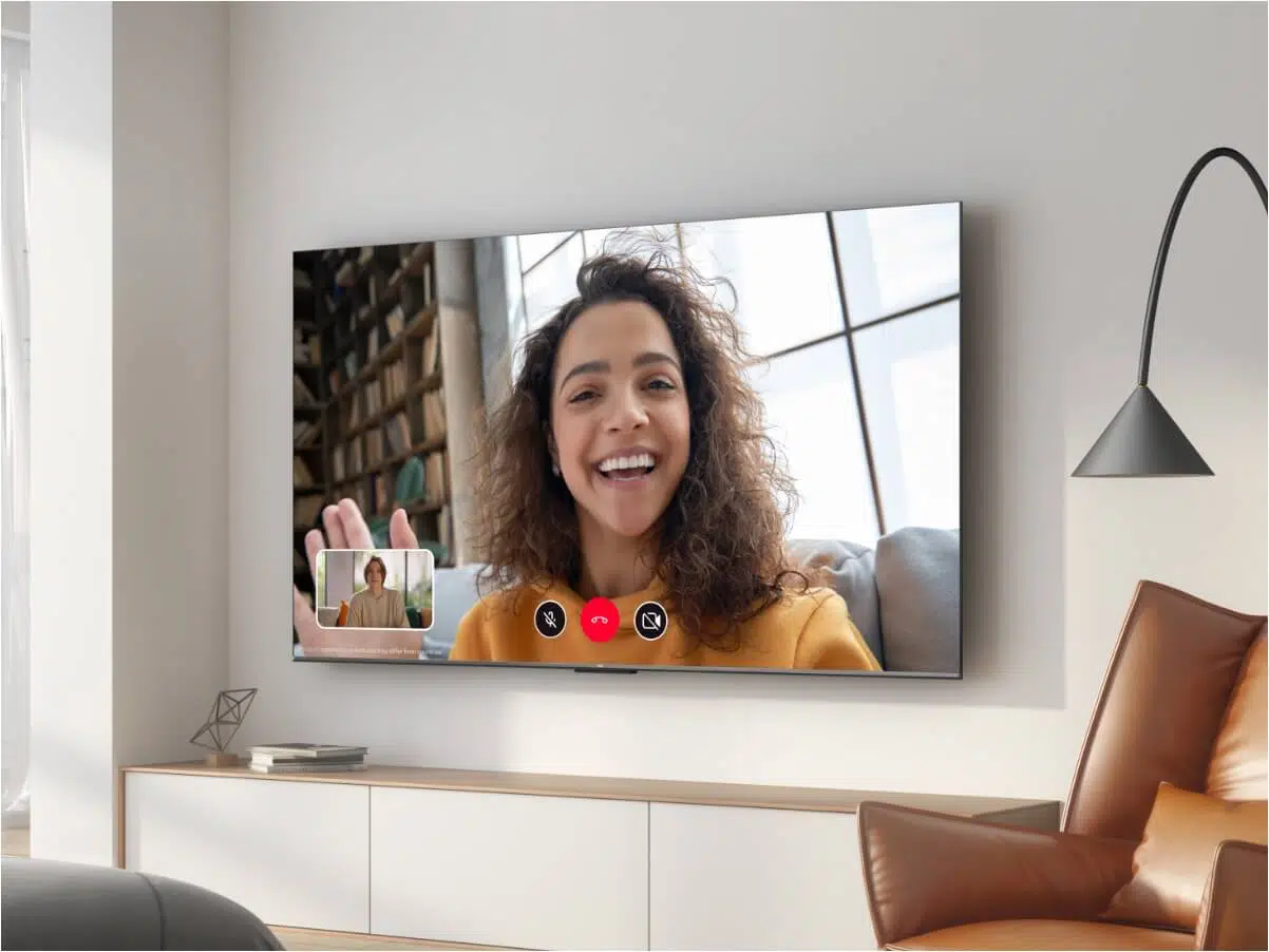 an image showcasing a video call using the Google Duo app on the TCL C635 TV. Show a family or friends having a video chat on the TV screen, emphasizing the convenience and connectivity of the feature