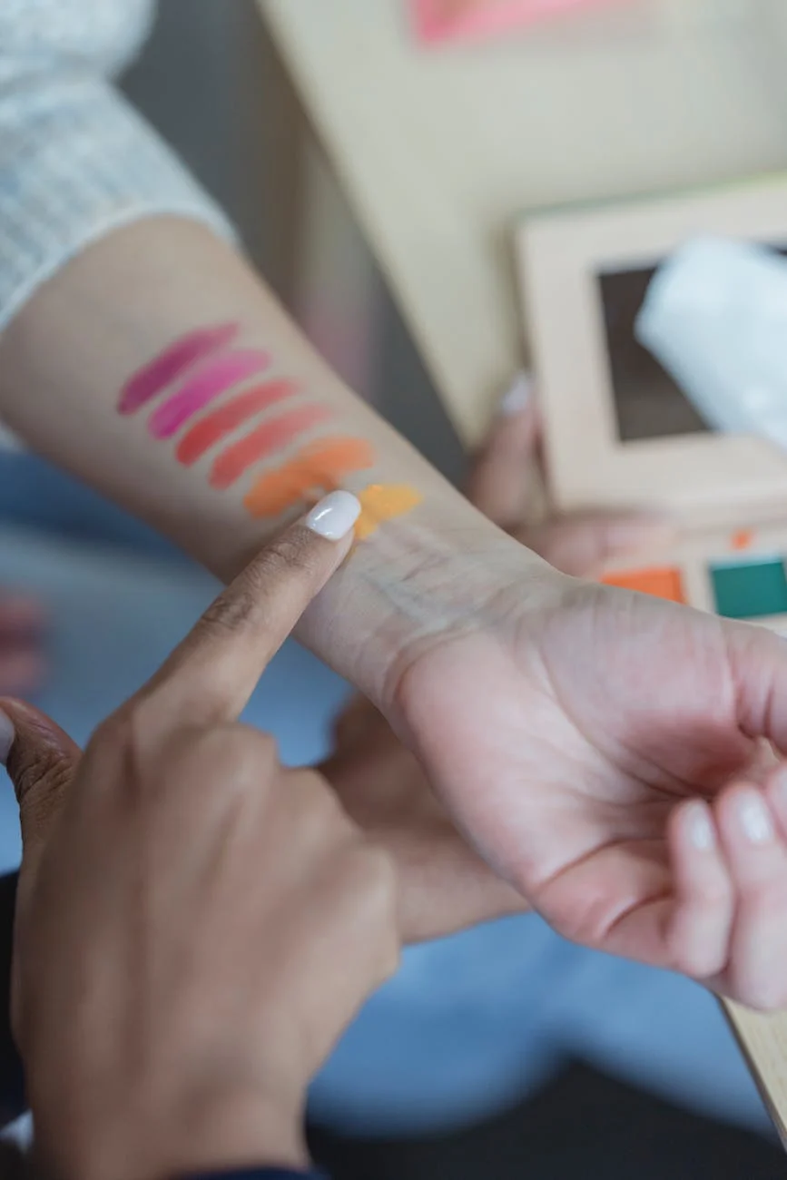 Woman's arm with several samples of makeup to test which looks best. Beautifilipina cosmetics and skincare are the best in the Philippines.