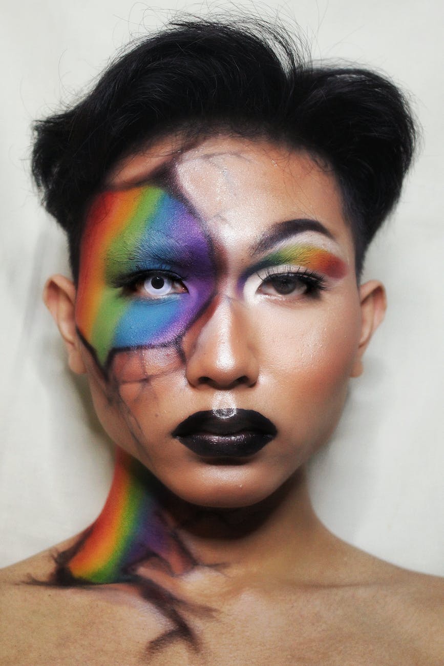 Rainbow paint across the face of a Filipino model. Explore your skin tone's best options with beautifilipina.com and the Beautifilipina Blog!