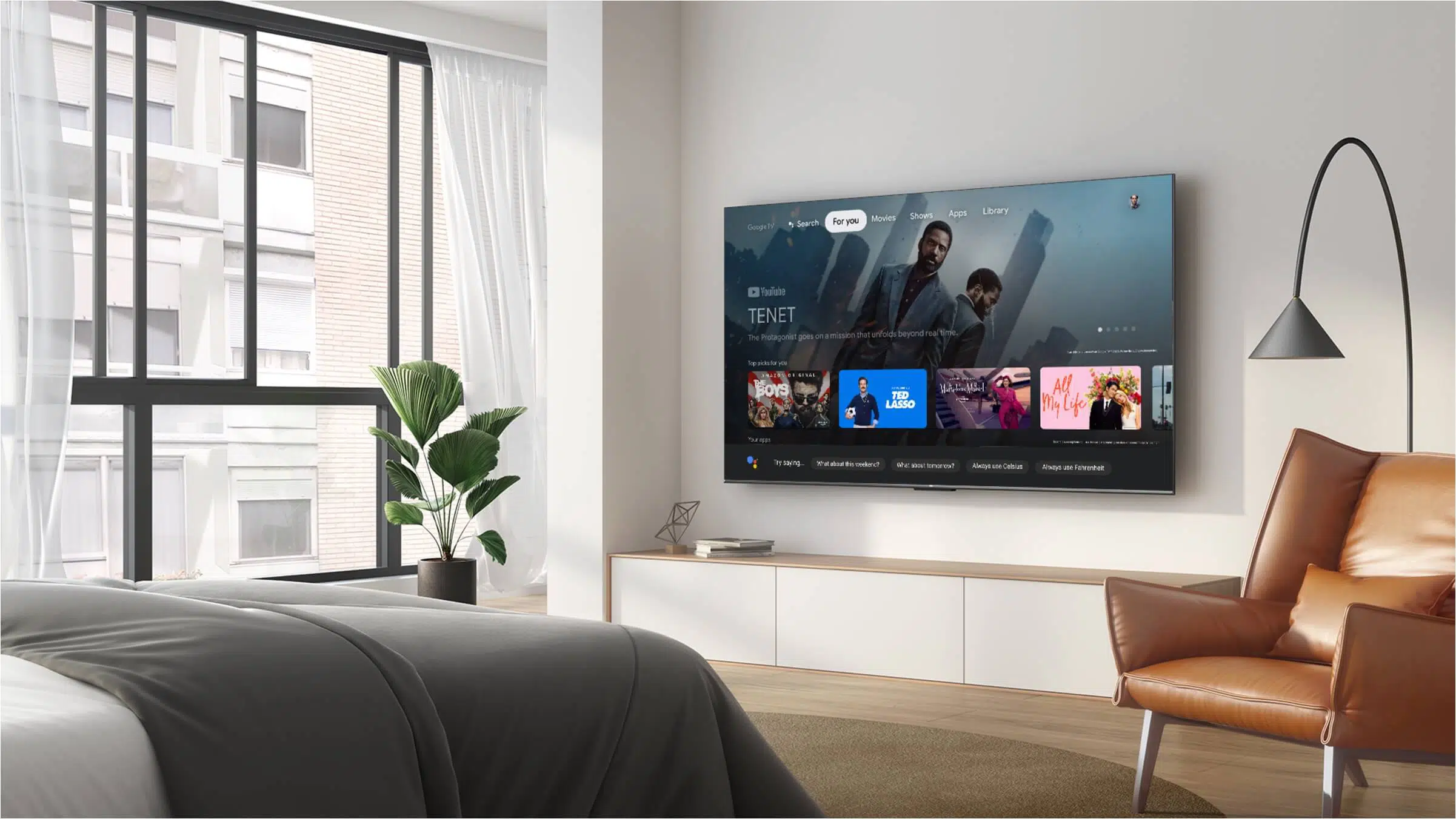 an image of the Google TV interface. Display the interface with app icons, search options, and voice command activation, highlighting the personalized user experience and voice command feature.